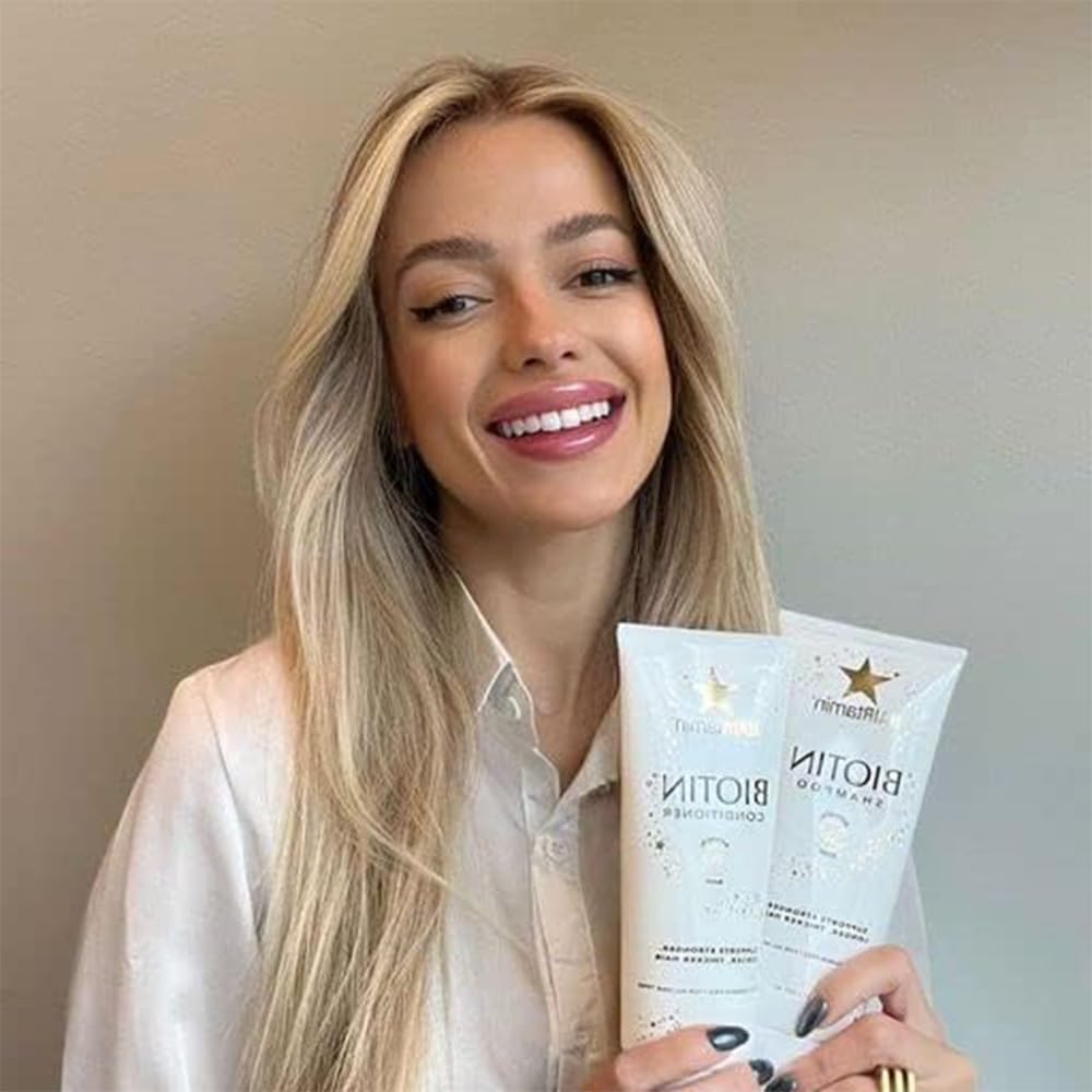 شامپو حجم دهنده بیوتین هیرتامین Hairtamin Biotin Shampoo