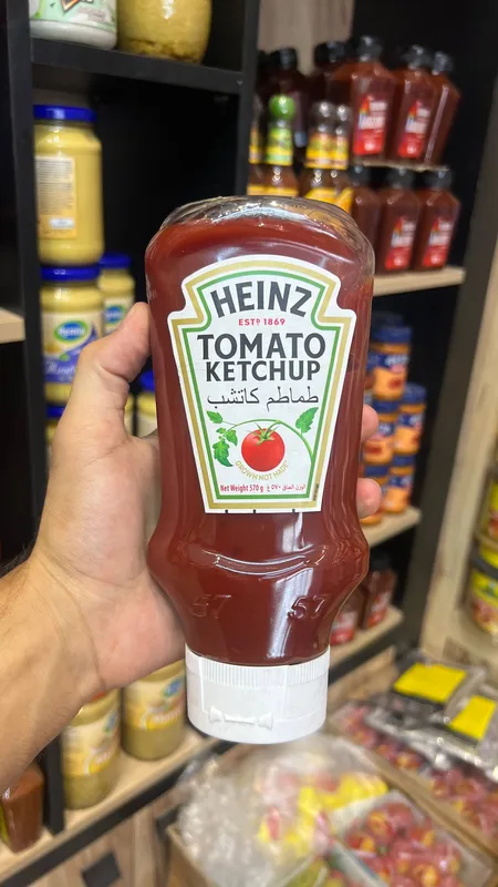 خرید سس کچاپ گوجه فرنگی هاینز Heinz Tomato Ketchup - وزن 570 گرم اورجینال تصویر محصول نیدومارکت